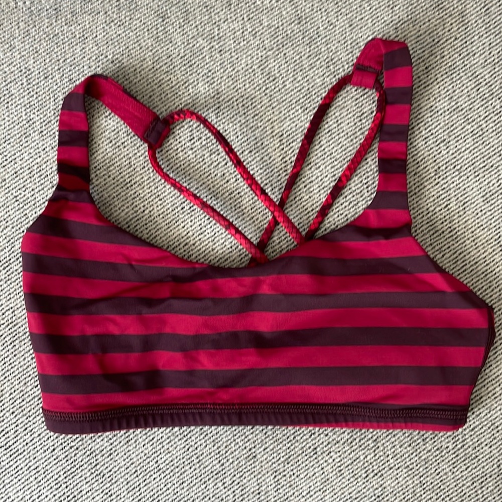Lululemon sports bra. Excellent condition. Size 4. Red and black striped.